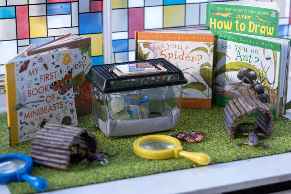 Bright children's books about insects and nature at Thrive Childcare, promoting interactive learning and exploration for young children.