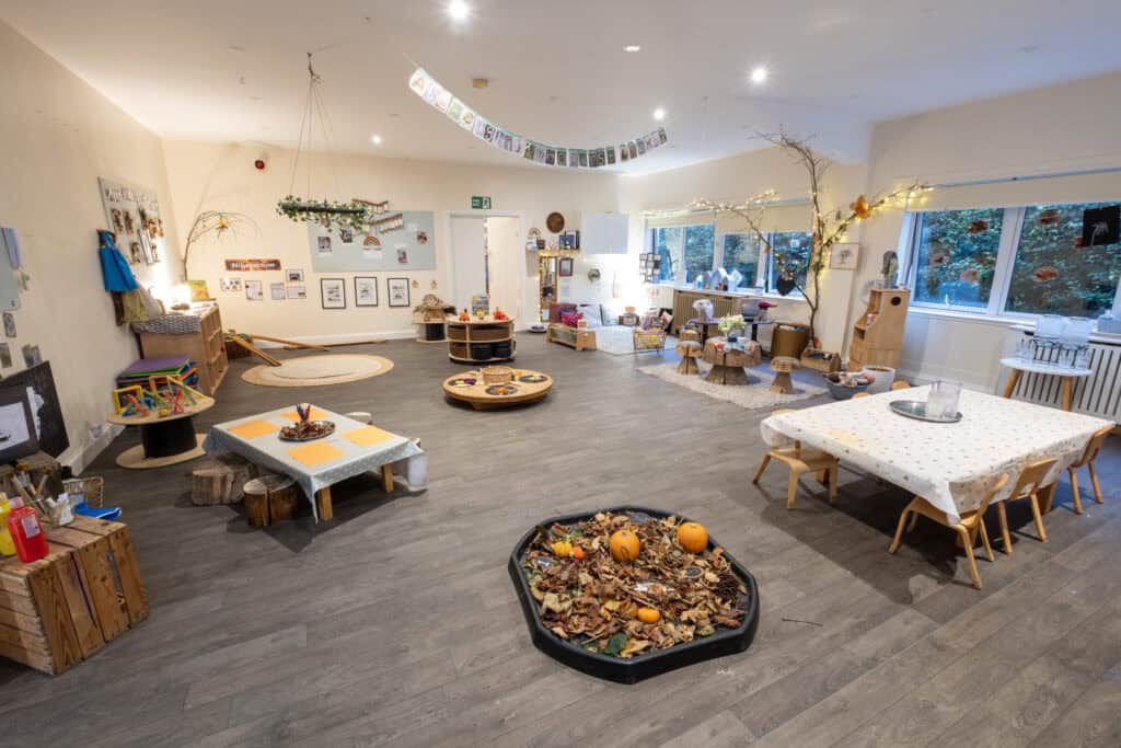A welcoming indoor playroom at Thrive Childcare with diverse activity zones for early childhood development and learning.