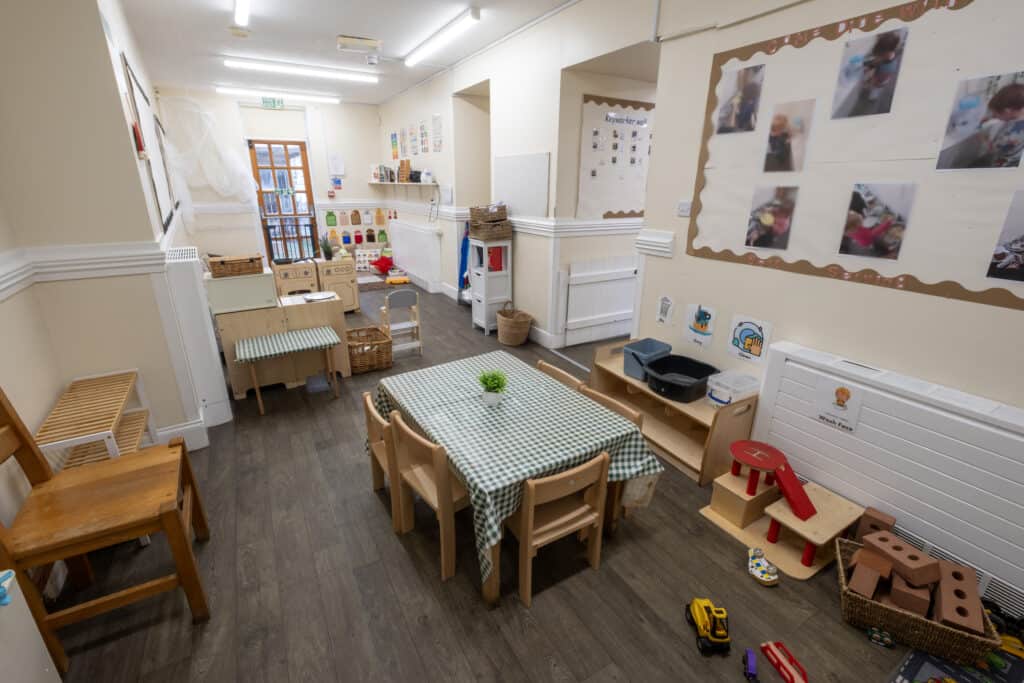 Bright nursery classroom at Thrive Childcare featuring toys, learning areas, and children’s activities for early childhood development and quality nursery care.