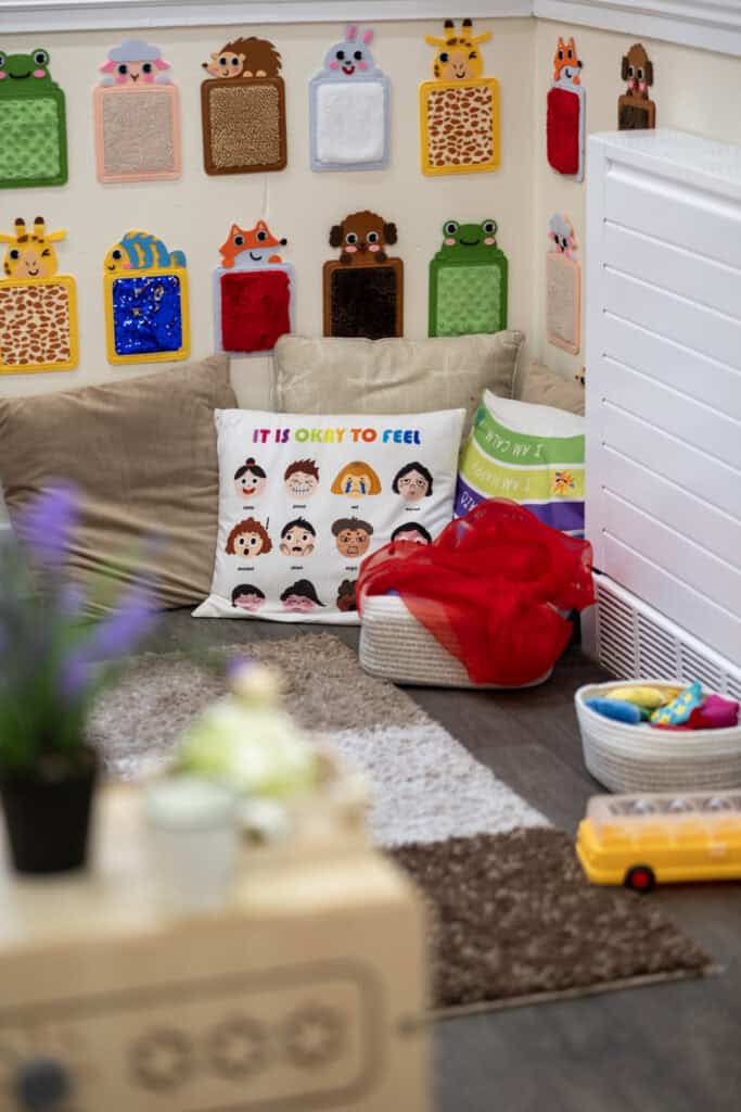 1. Colourful animal-themed wall pockets for kids’ organisation and playroom decor at Thrive Childcare, fostering a fun learning environment for children.