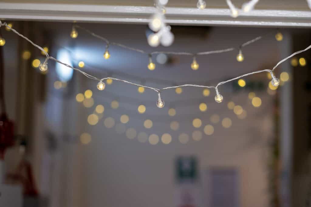 String lights decoration in a cozy indoor setting, perfect for creating a warm, inviting atmosphere in a childcare or early years environment.