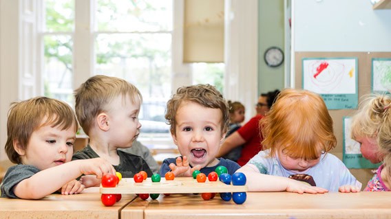 Bright preschool children engaging in educational activities at Thrive Childcare, fostering early childhood development and learning in a safe, nurturing environment.