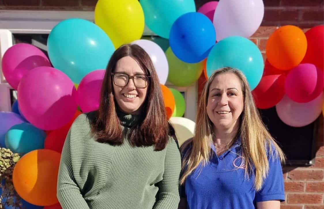 Brightly coloured balloons at Thrive Childcare depicting a cheerful celebration with staff members, showcasing a joyful and welcoming environment for children.