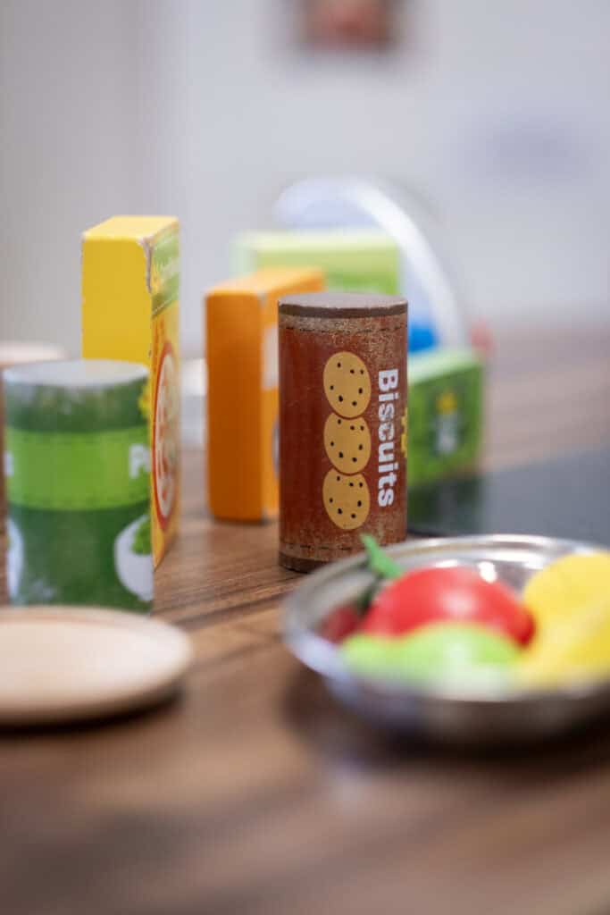 Warm, inviting childcare environment with educational toys and healthy snacks at Thrive Childcare, fostering early development, learning, and fun for young children.