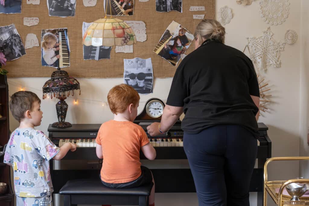Engaging children in music lessons at Thrive Childcare, fostering early childhood development and creativity. Bright, nurturing environment with experienced staff supporting young learners.