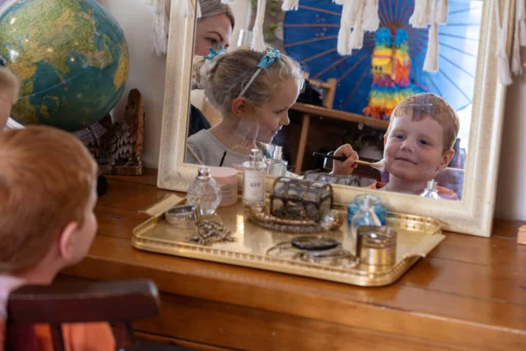 Bright-eyed children enjoying creative activities at Thrive Childcare, fostering early development and imaginative play in a safe, nurturing environment.