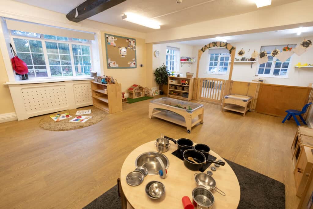 Bright, welcoming indoor childcare space at Thrive Childcare with natural light, versatile play areas, and child-friendly toys designed for early childhood development and learning.