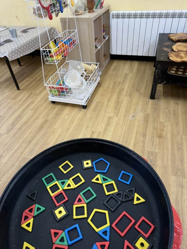 Colourful geometric shape toys for engaging early childhood learning at Thrive Childcare, promoting creativity and cognitive development in young children.