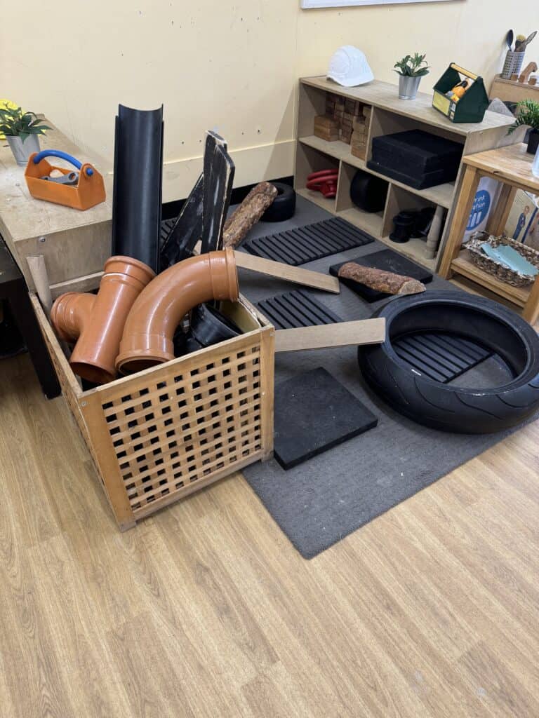 Climbing and sensory play equipment for children at Thrive Childcare, promoting active learning and development through interactive indoor activities and outdoor climbing structures.