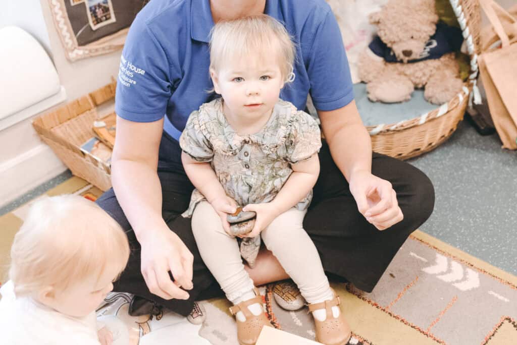 Children engaging in early childhood education activities at Thrive Childcare in a nurturing nursery environment.