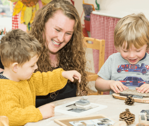 Friendly childcare environment with happy children and caring staff at Thrive Childcare, promoting early learning, development, and fun for kids in a nurturing setting.