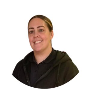 Caring childcare professional at Thrive Childcare, dedicated to fostering children's development in a safe, nurturing environment, with experienced staff and engaging activities.