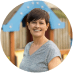 Bright smiling child enjoying outdoor play at Thrive Childcare, highlighting nurturing early childhood education and engaging activities in a safe environment.