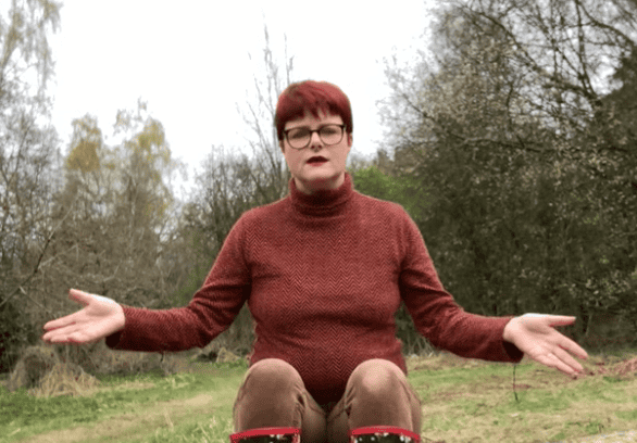 Early childhood educator engaging outdoors with children at Thrive Childcare, fostering learning and development in a nurturing environment.