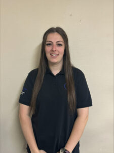 Friendly childcare professional at Thrive Childcare providing nurturing early childhood education and support in a warm, inviting environment.