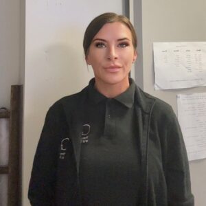 Friendly childcare professional at Thrive Childcare, supporting children's development and learning in a nurturing environment in the UK.