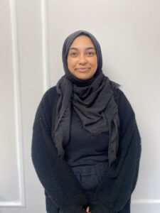 1. Caring nursery staff member at Thrive Childcare, promoting early childhood development and a nurturing environment for children's growth.