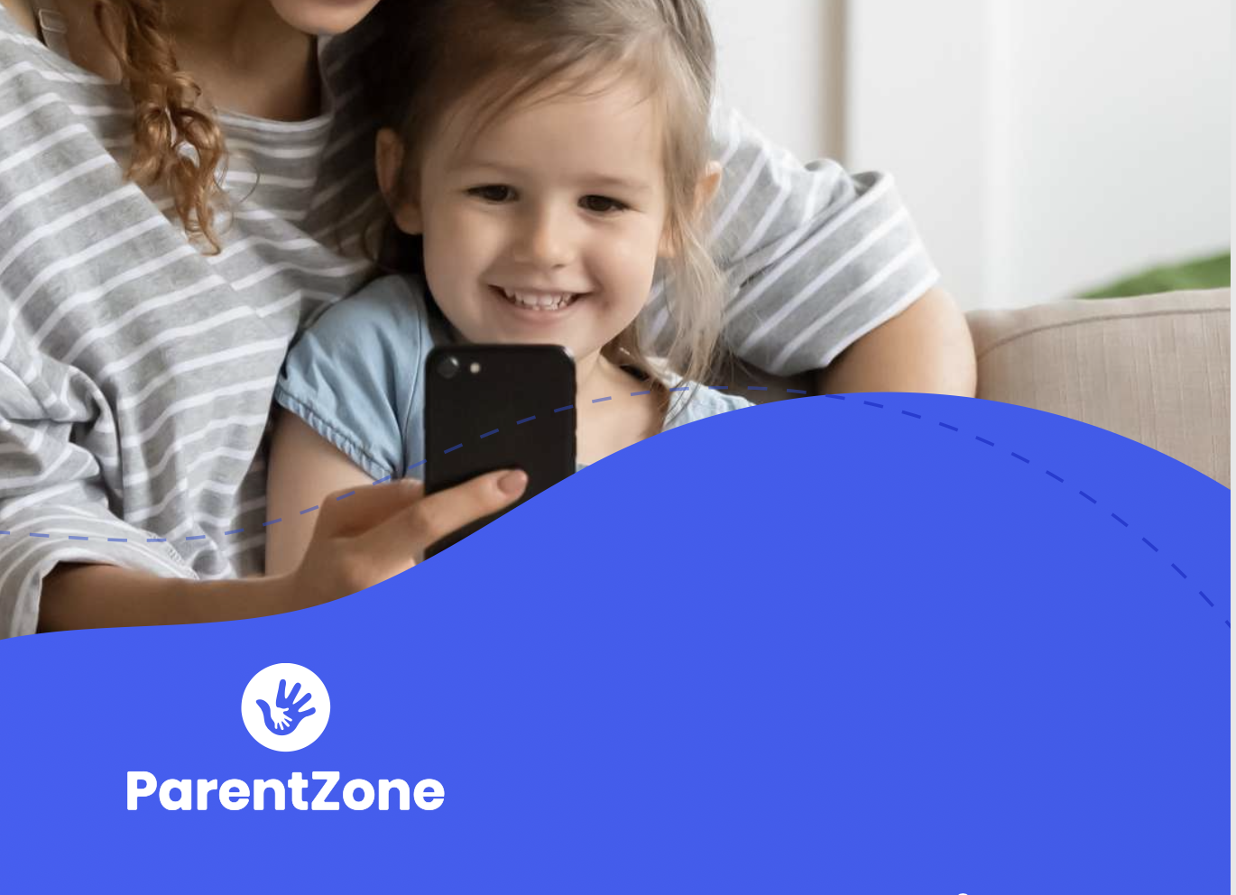 Young girl and parent using a smartphone at Thrive Childcare, a trusted early childhood education setting. Engaged in modern learning and family communication in a caring, safe environment.