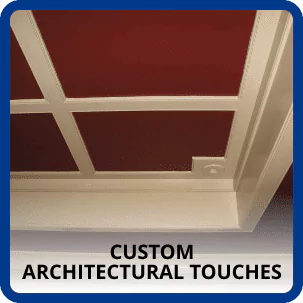 White Grid-Patterned Ceiling With Custom Architectural Touches, Featuring A Square Recessed Light On A Red Background.
