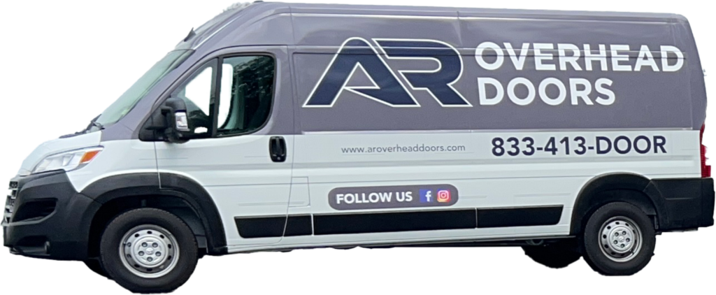 A van showcasing "AR Overhead Doors" branding cruises through the service area with its contact number, website, and social media icons prominently displayed on its side.