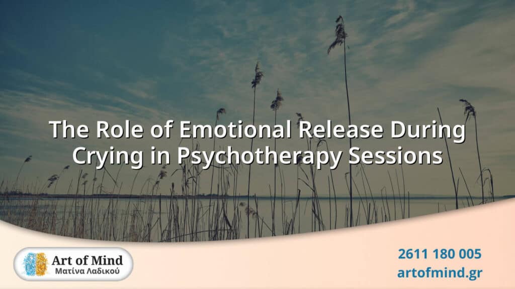 A person in a calm therapy session expressing deep emotional release through crying, symbolizing vulnerability and healing in psychotherapy at Art of Mind center.