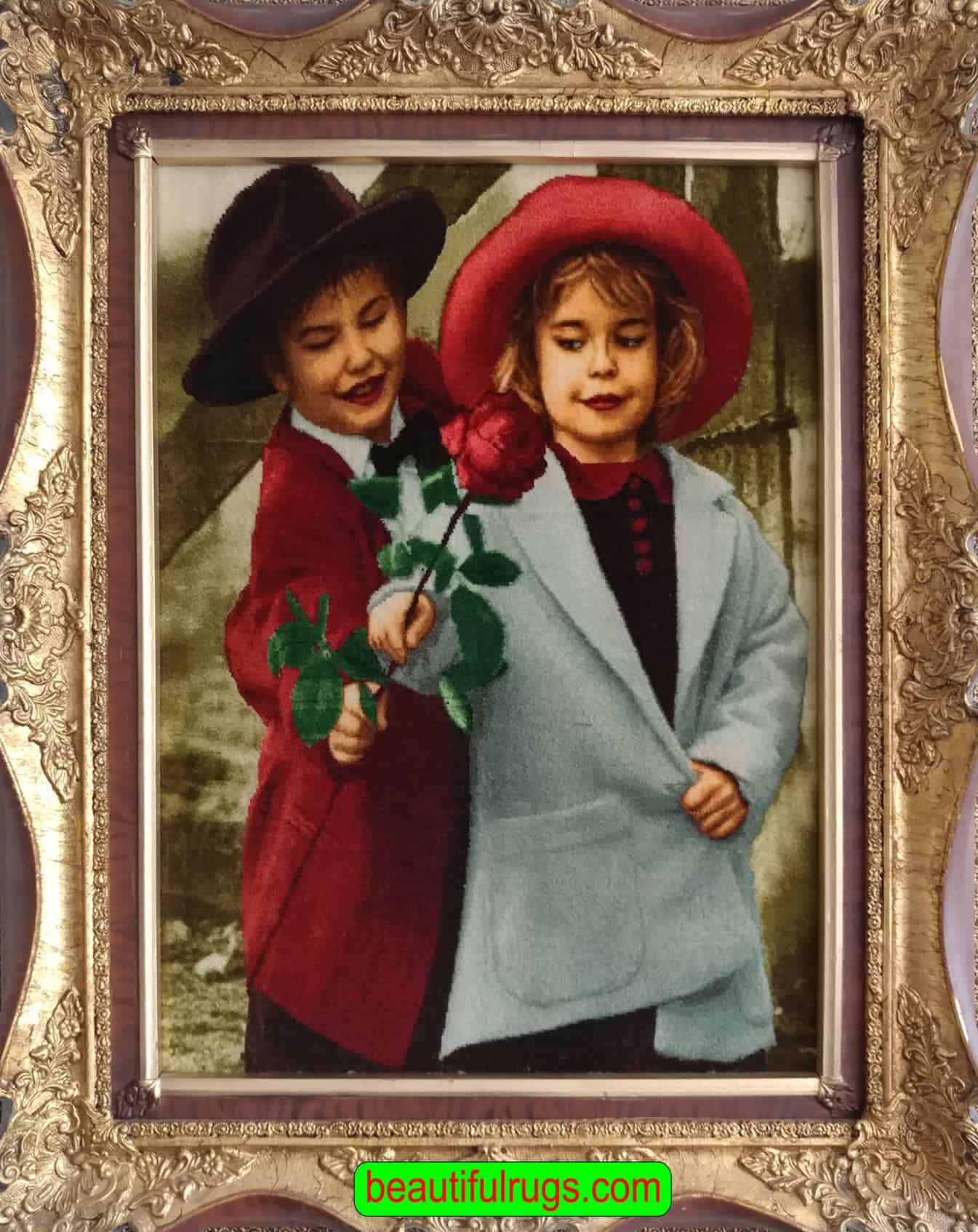 Persian pictorial rug. Handmade Persian wall hanging rug, a young boy with a red jacket is handing a red rose to a young girl. Size 1.8x2.5