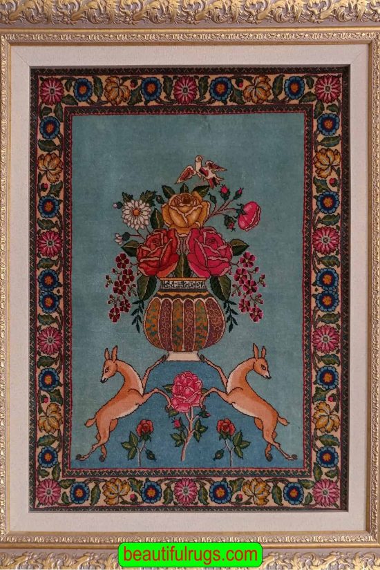 Handmade wall hanging rug. Antique Persian Tabriz wall rug in turquoise, two deers are holding a vase of flower. Size 1.10x2.6