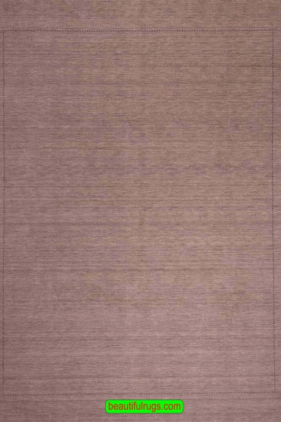 Plain color wool oriental beige color area rug. Size 8.4x9.10