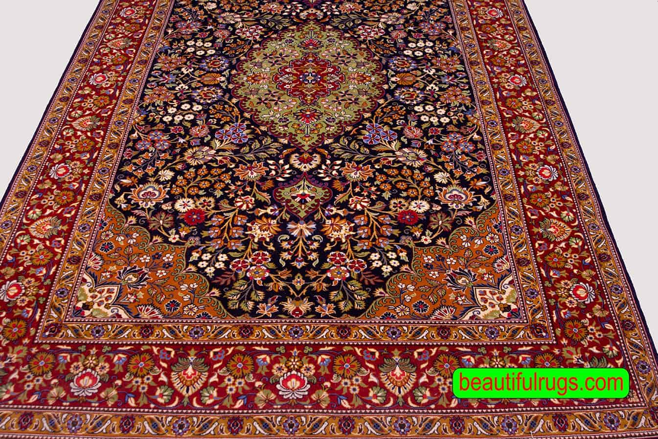 Carpets of Iran for sale at beautiful Rugs. Floral style handmade Iranian Qum carpet in navy blue and red color. Size 5.5x8.10