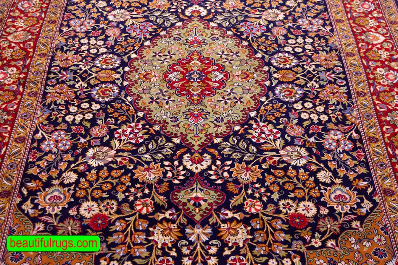 Carpets of Iran for sale at beautiful Rugs. Floral style handmade Iranian Qum carpet in navy blue and red color. Size 5.5x8.10