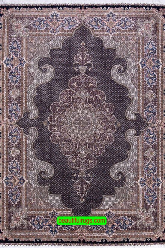 Wool and silk Persian rug in black and chestnut colors. Size 6.8x10.