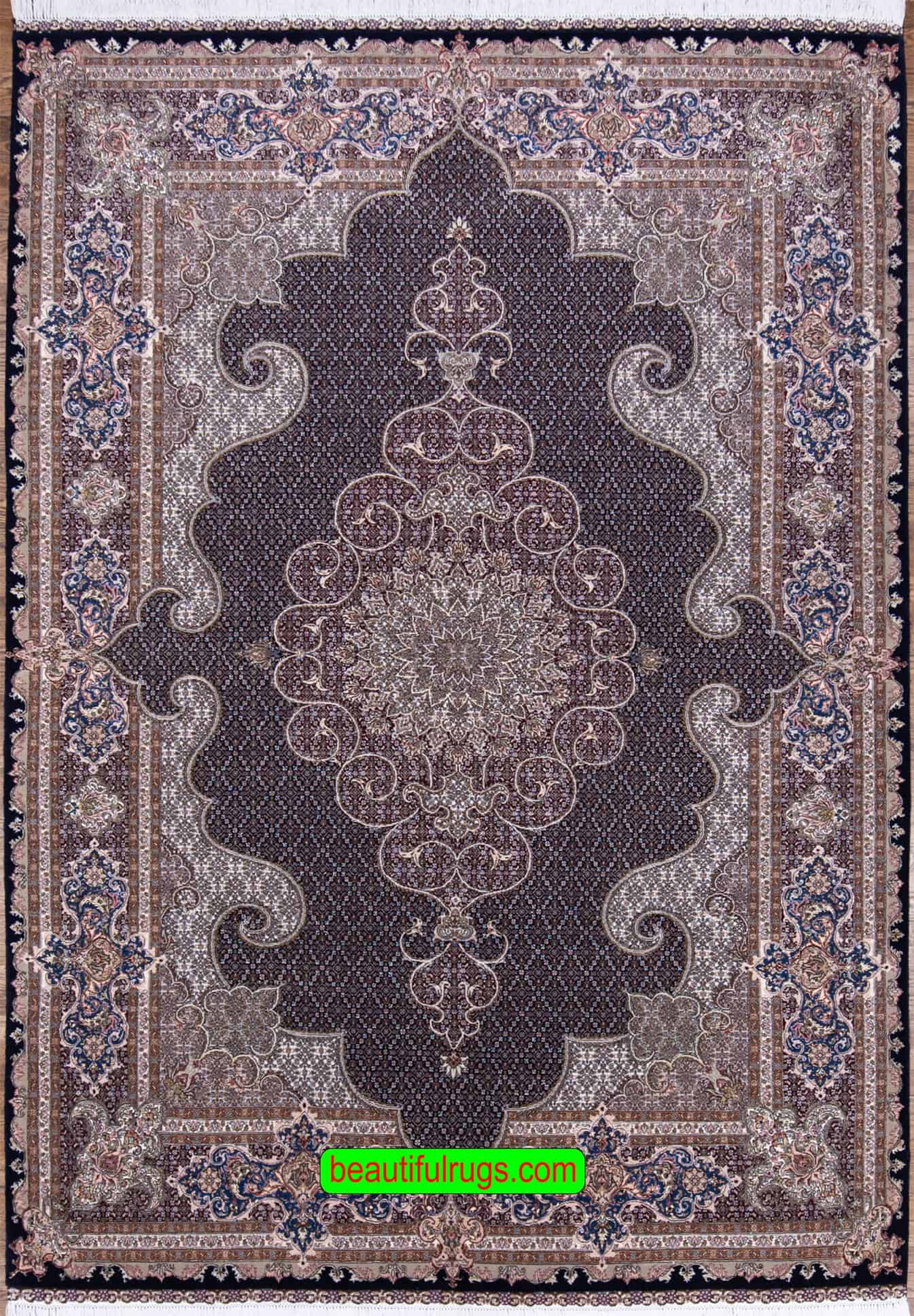 Wool and silk Persian rug in black and chestnut colors. Size 6.8x10.