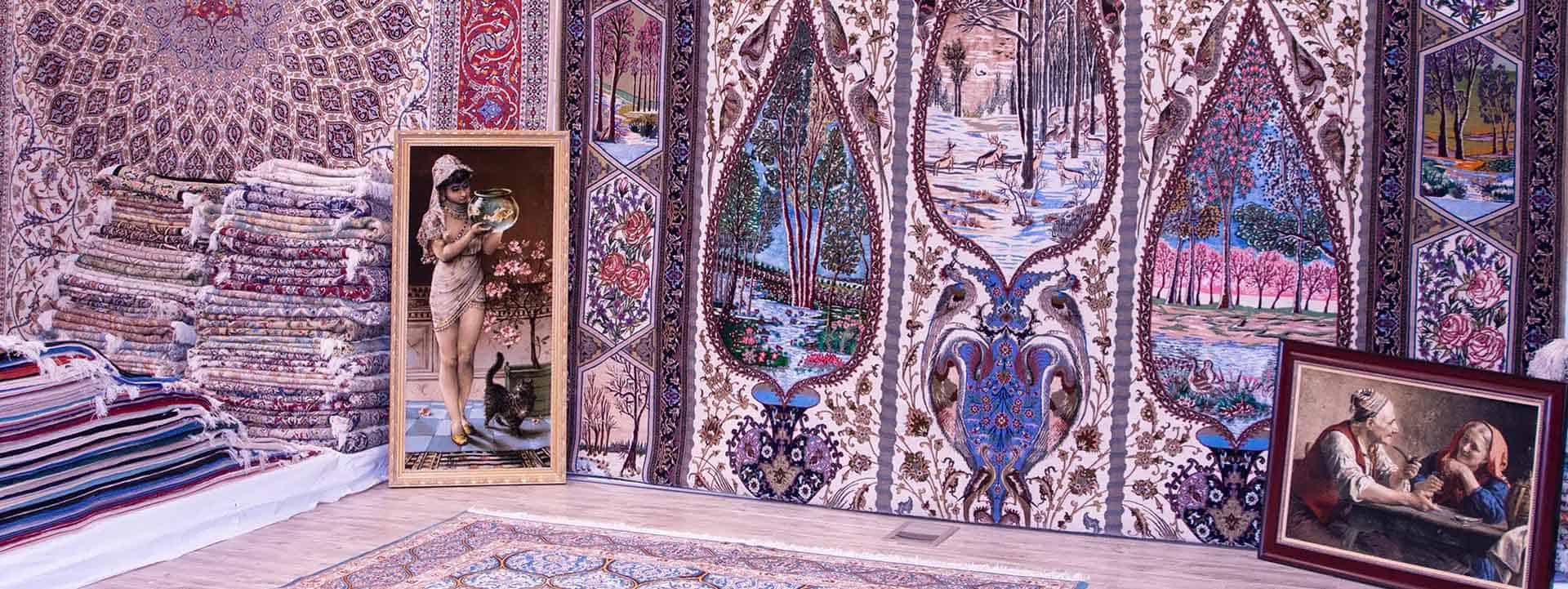 Beautiful Rugs - Accredited rug store Chicago image used for the main website page, rugs hung wall with two pictorial rugs on front.