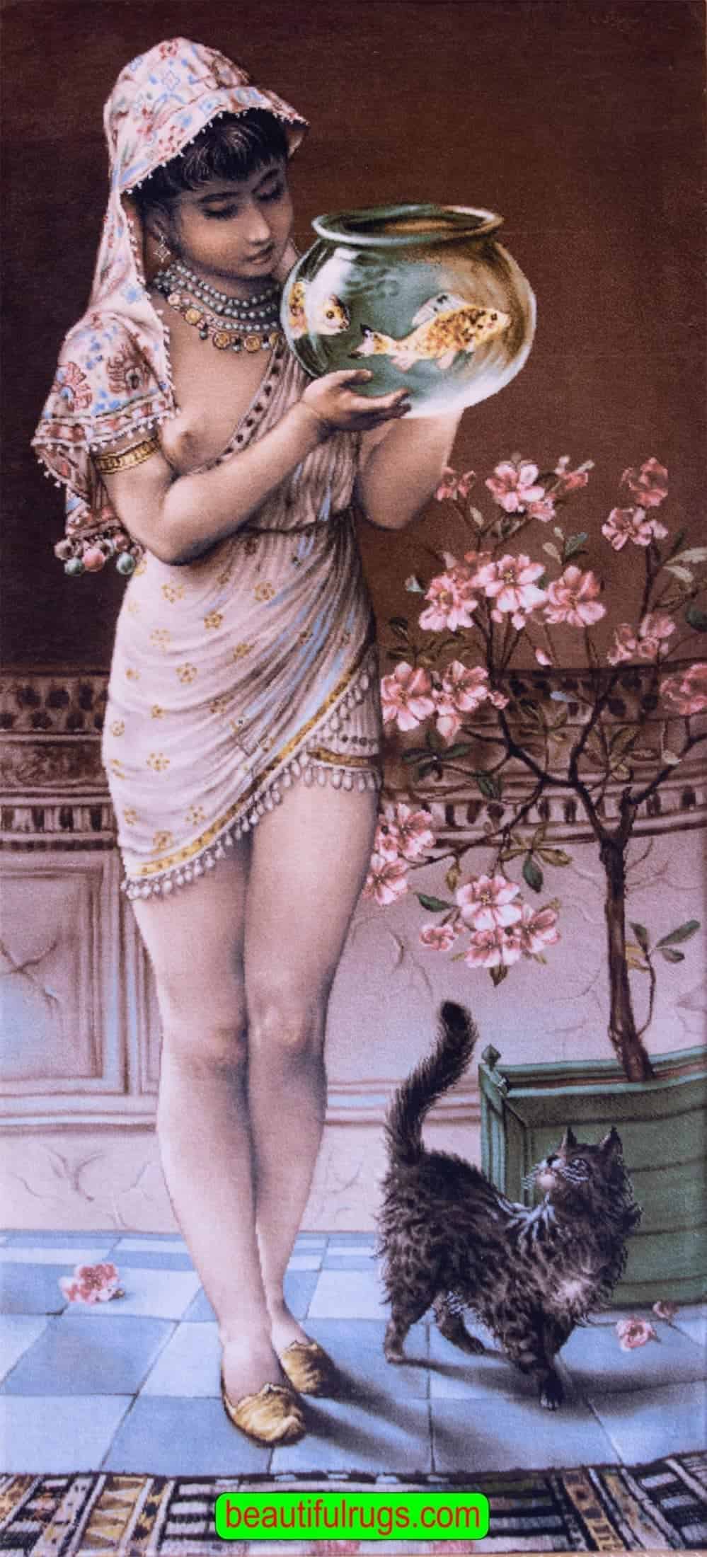 Handmade Persian Tabriz wall hanging rug, a youg girl holding a vase in hand with a fish inside water and a cat is watching her. Size 1.9x3.9.