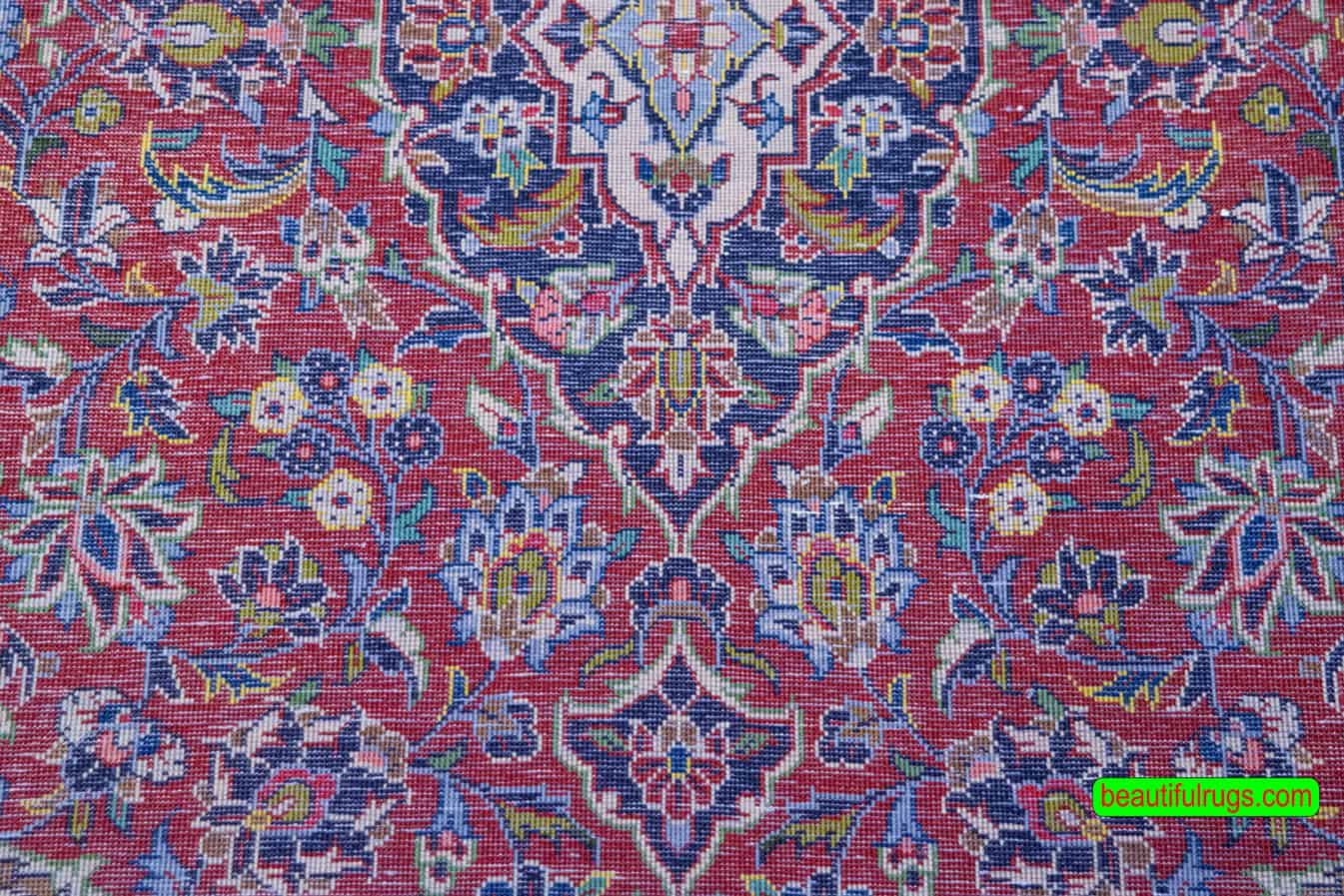 Handmade Persian Kashan carpet in red color. Size 3.6x5.2.