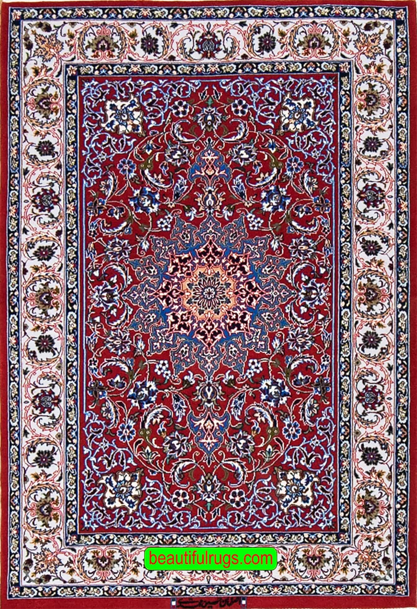 Hand knotted Persian Isfahan rug in red color, made of wool on silk foundation. Size 2.9x4.2