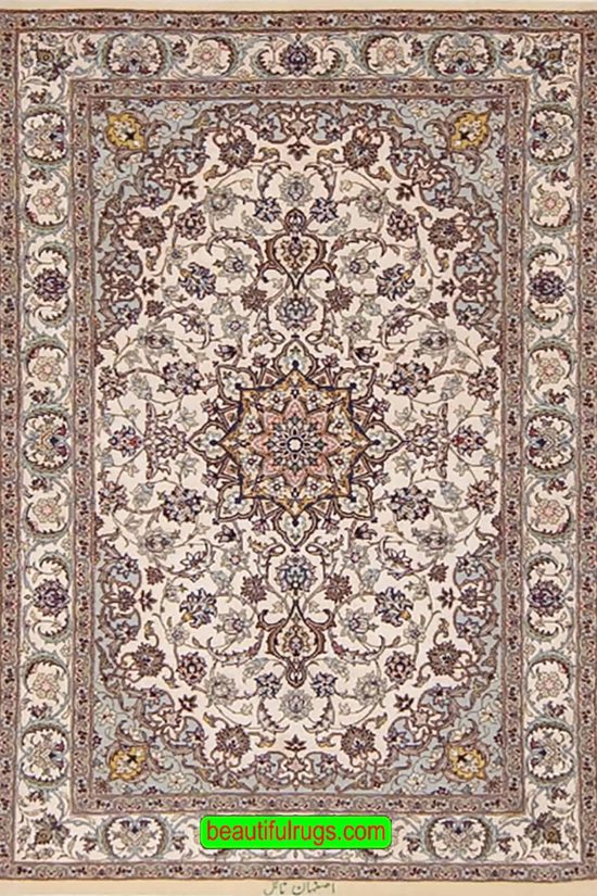 Handmade Persian Isfahan silk and wool rug in beige and earth tone colors. Size 2.9x4.6.