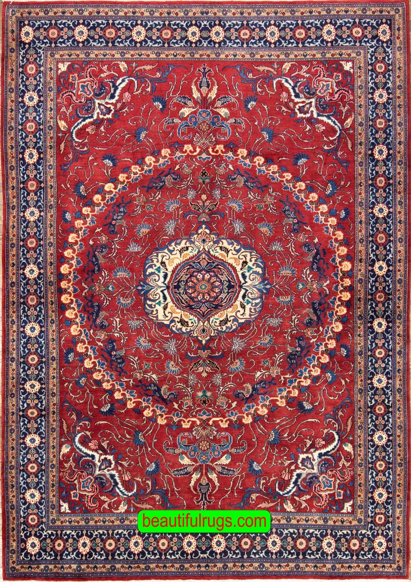 Handmade Persian Tabriz rug in red color. Size 6.10x10.2.