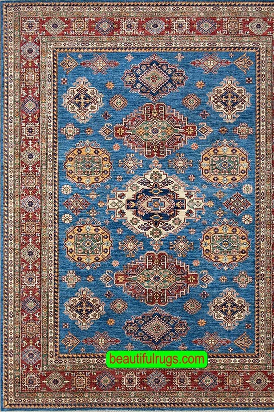 Geometric Kazak style rug in blue color made in Pakistan. Size 8.2x10.6.