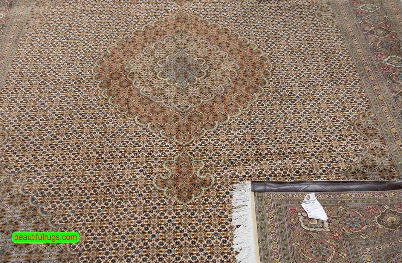 Handmade Persian Tabriz wool and silk rug with medallion in beige and green colors. Size 6.9x10.