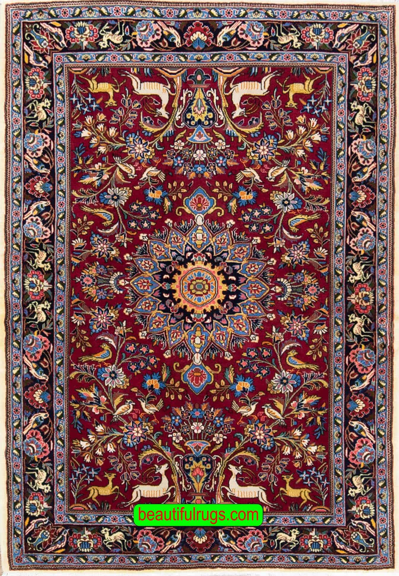 Handmade Persian Sarouk area rug with birds and animal motifs in red color. Size 4x5.10.