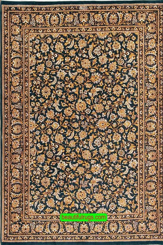 Handmade Persian Qum rug with green and gold colors made of kork wool. Size 4.2x6.2.