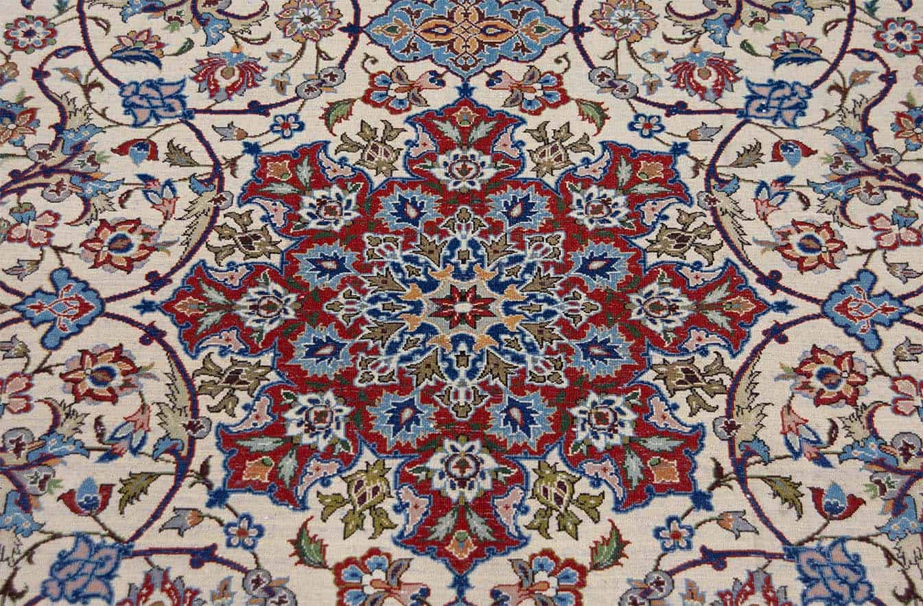 Authentic handmade antique Persian Isfahan Wool rug with beige and red colors. Rug size 5x7.