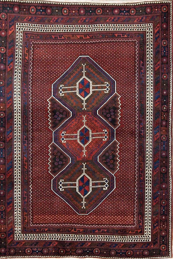 Handmade geometric style Persian Sirjan wool area rug in red color. Size 5.5x7.9.