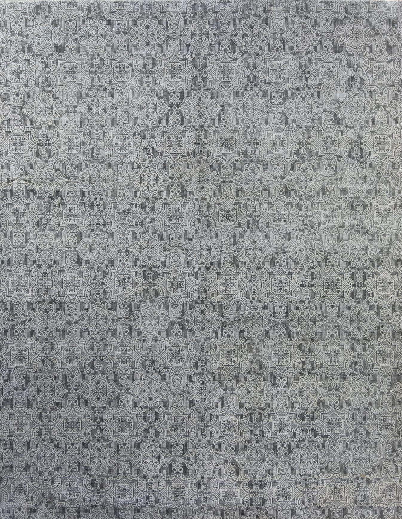 A designer contemporary rug in gray color made of wool. Size 7.10x10.1.