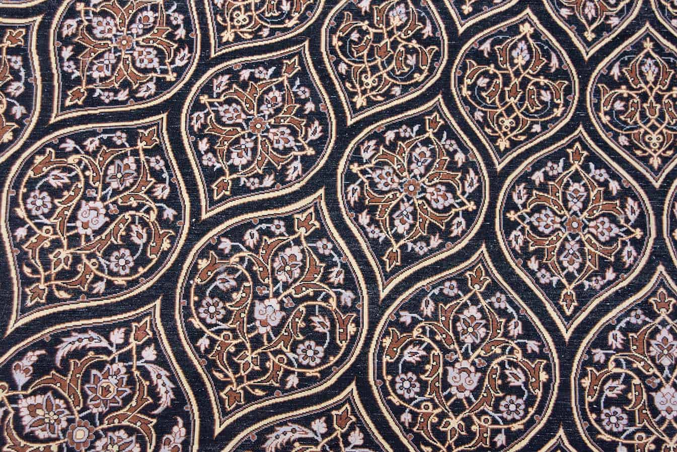 Hand woven Persian Isfahan medallion rug in black and gold colors. Size 8.3x11.8.