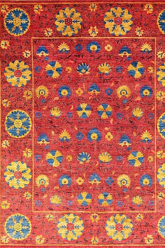 Magenta area rug designed with magenta and blue made of wool. size 8x10.3.