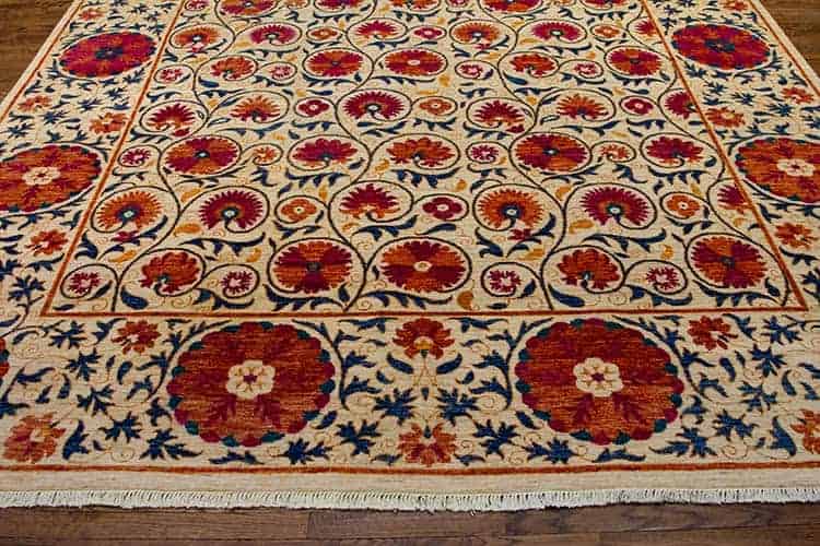 Handmade modern magenta rug in beige and magenta colors made of handspun wool in Pakistan. Size 9.1x12.2.