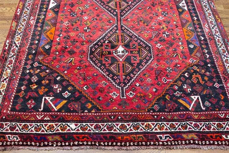 Southwestern rugs, handmade wool Persian Shiraz Southwester rug in red color. Size 5.6x8.8.