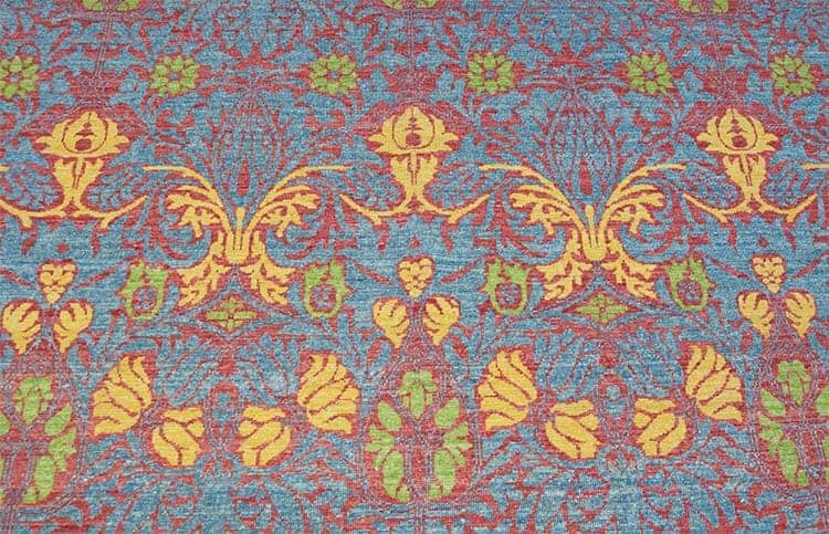 Red and yellow rug, quality handmade designer rug made from fine wool crafted in Pakistan. Size 7.10x9.9.
